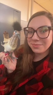 Elisha Wray posing with her Roadrunner award.