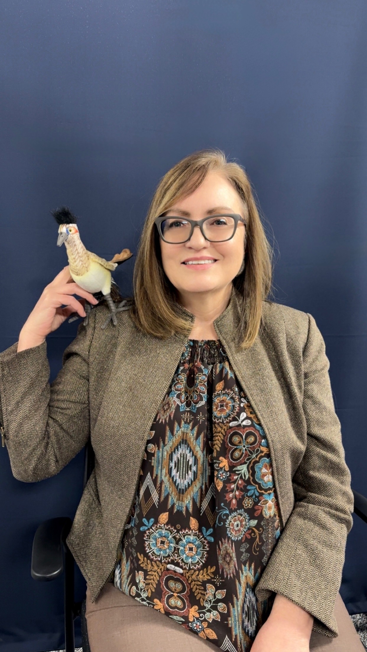 Anna Sandoval posing with her Roadruner award.