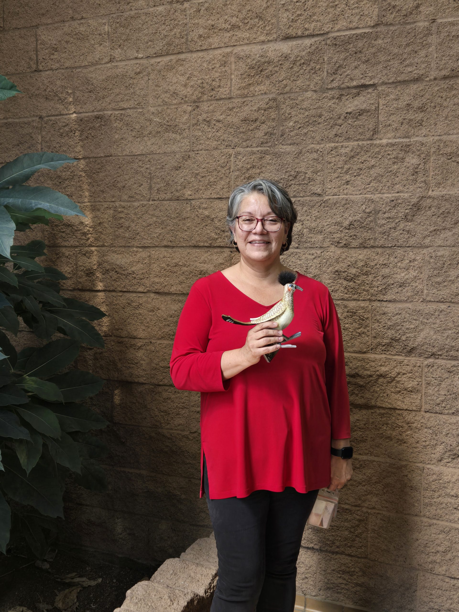 Jackie Corriz holding her Roadrunner award.