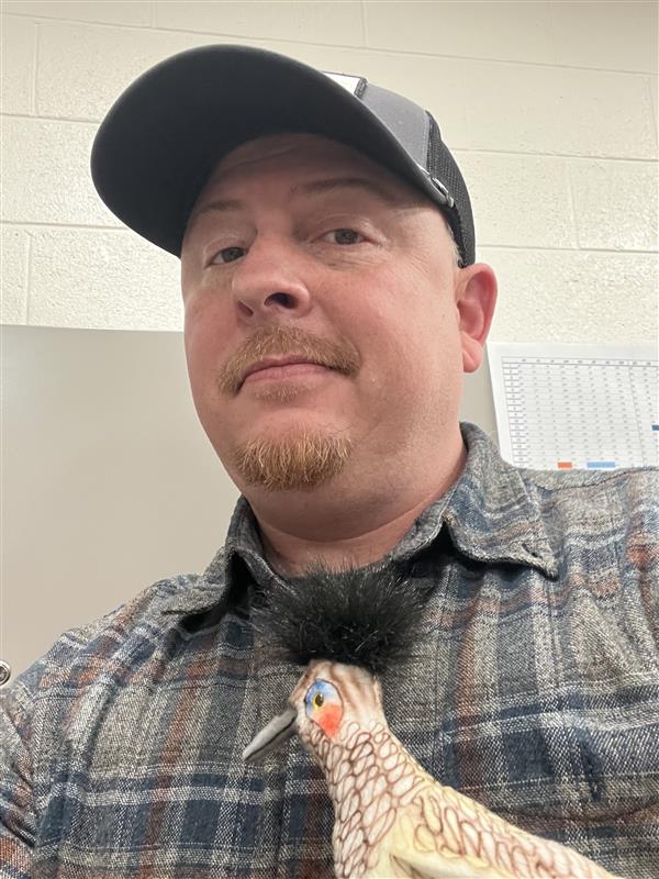 Nick Martinez holding a Roadrunner award.